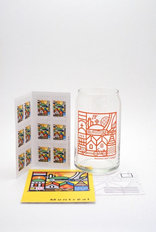 Photo of Encore MTL limited edition glass, stamps and post card